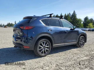 2018 Mazda CX-5 Grand Touring z VIN JM3KFBDM5J0379246, wystawiony jako Copart lot #58587865 z przebiegiem 46 339 mil mil oraz Szkody całkowita. Historia ofert i sprzedaży dostępna na DreamBid. Obrazek 3.