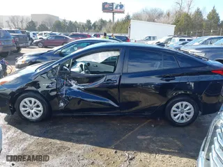 2020 Toyota Prius L Eco with VIN JTDKARFU7L3119834, listed as a IAAI auction lot 41653177 with 140,964 mi miles. Bid and sale history available at carsss.com. Image 14.