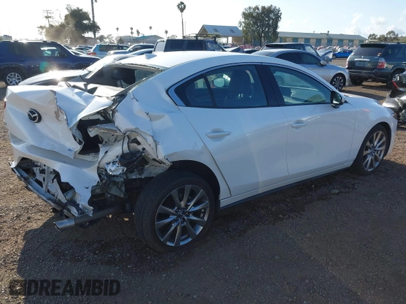 2020 Mazda 3 Premium with VIN 3MZBPAEM3LM132772, listed as a IAAI auction lot 42067269 with 53,751 mi miles and . Bid and sale history available at DreamBid. Image 4.