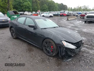 2018 Maserati Ghibli S Q4 z VIN ZAM57YTA5J1304811, wystawiony jako IAAI lot #42352300 z przebiegiem 52 819 mil mil oraz . Historia ofert i sprzedaży dostępna na DreamBid. Obrazek 1.