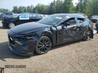 2022 Mazda 3 Premium z VIN JM1BPAML0N1517945, wystawiony jako Copart lot #63263285 z przebiegiem 48 889 mil mil oraz Czysty tytuł • Clean title. Historia ofert i sprzedaży dostępna na DreamBid. Obrazek 1.