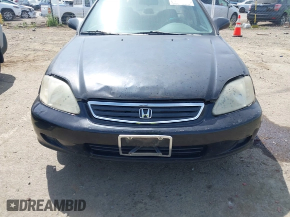 1999 Honda Civic LX with VIN JHMEJ6674XS003829, listed as a IAAI auction lot 42121298 with 238,936 mi miles. Bid and sale history available at carsss.com. Image 6.