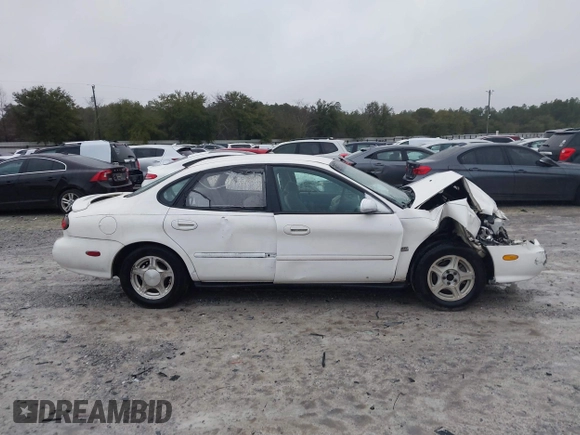 1999 Ford Taurus SE with VIN 1FAFP53S4XA185115, listed as a IAAI auction lot 41263216 with 182,770 mi miles. Bid and sale history available at carsss.com. Image 13.