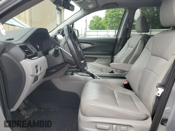 2019 Honda Pilot Touring 8-Passenger z VIN 5FNYF5H91KB033661, wystawiony jako Copart lot #56650155 z przebiegiem 73 512 mil mil oraz Szkoda całkowita • Salvage title. Historia ofert i sprzedaży dostępna na DreamBid. Obrazek 7.
