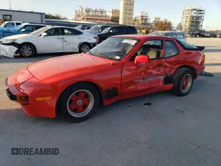 1984 Porsche 944 with VIN WP0AA0947EN456918, listed as a Copart auction lot 87309324 with 95,532 mi miles and Salvage Title. Bid and sale history available at carsss.com. Image 1.