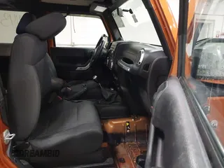 2011 Jeep Wrangler Rubicon with VIN 1J4BA6D15BL624268, listed as a IAAI auction lot 41430121 with 142,433 mi miles and . Bid and sale history available at carsss.com. Image 5.