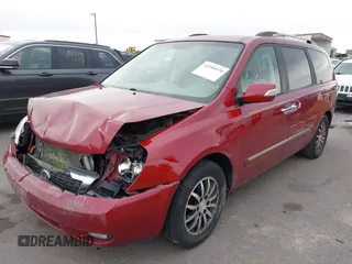 2012 Kia Sedona EX with VIN KNDMH4C76C6463143, listed as a IAAI auction lot 41990970 with 214,045 mi miles. Bid and sale history available at carsss.com. Image 17.