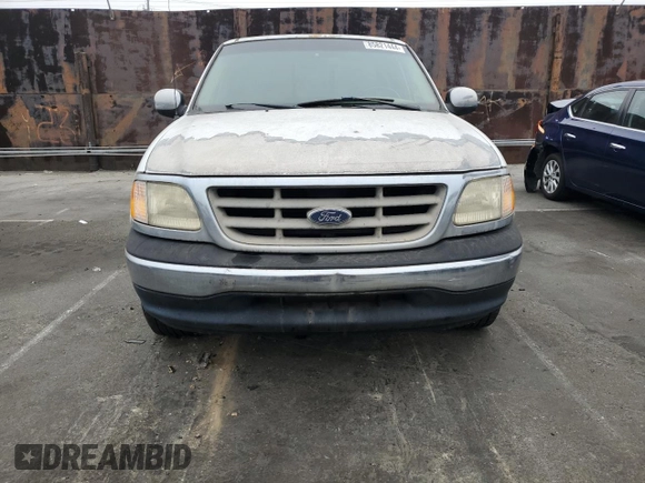 2000 Ford F-150 XL with VIN 1FTRX17L5YKA74815, listed as a Copart auction lot 85821444 with 0 mi miles and Salvage Title. Bid and sale history available at carsss.com. Image 5.