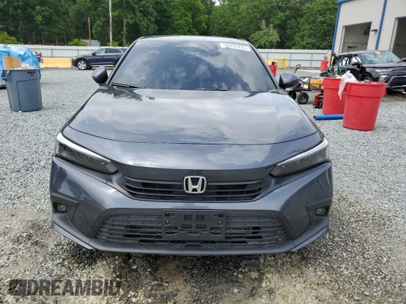 2024 Honda Civic Touring z VIN 2HGFE1F96RH324748, wystawiony jako Copart lot #58833725 z przebiegiem Nie podano mil oraz Szkoda całkowita • Salvage title. Historia ofert i sprzedaży dostępna na DreamBid. Obrazek 5.