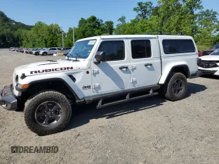 2023 Jeep Gladiator Rubicon with VIN 1C6JJTBG9PL546437, listed as a Copart auction lot 62536575 with 14,106 mi miles and Salvage title. Bid and sale history available at DreamBid. Image 1.