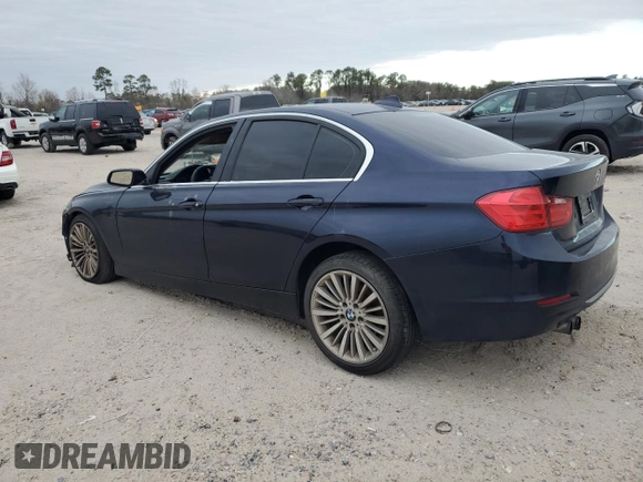 2012 BMW 3 Series 328i with VIN WBA3A5C57CF341019, listed as a Copart auction lot 88589685 with 107,295 mi miles and Salvage Title. Bid and sale history available at DreamBid. Image 2.