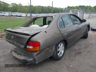 1999 Nissan Altima XE with VIN 1N4DL01D2XC150751, listed as a IAAI auction lot 42042391 with 258,949 mi miles and . Bid and sale history available at carsss.com. Image 4.