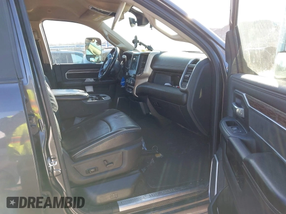 2021 Ram 2500 Laramie z VIN 3C6UR5FL7MG629012, wystawiony jako IAAI lot #41369353 z przebiegiem 168 099 mil mil oraz . Historia ofert i sprzedaży dostępna na DreamBid. Obrazek 5.