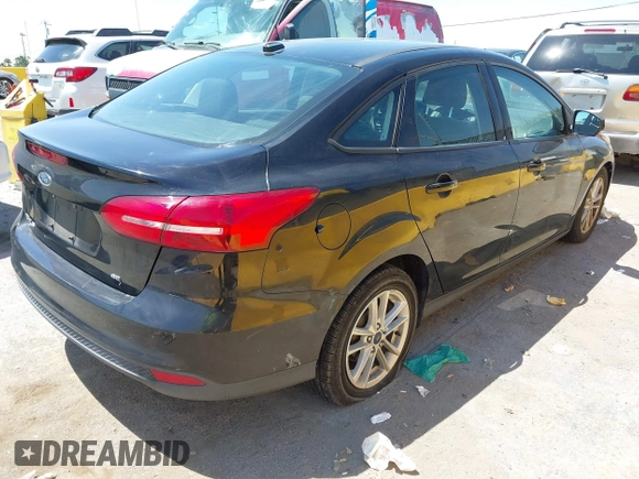 2017 Ford Focus SE with VIN 1FADP3F23HL223401, listed as a IAAI auction lot 42639766 with 101,717 mi miles and . Bid and sale history available at DreamBid. Image 4.