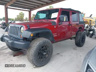 2012 Jeep Wrangler Unlimited Sport z VIN 1C4BJWDG3CL207291, wystawiony jako IAAI lot #42211454 z przebiegiem 110 864 mil mil oraz . Historia ofert i sprzedaży dostępna na DreamBid. Obrazek 2.