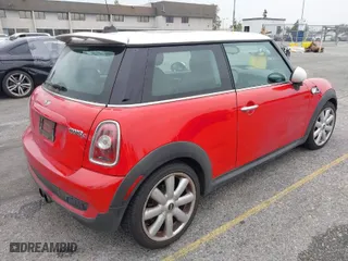 2009 MINI Cooper Hardtop S with VIN WMWMF73549TW87458, listed as a IAAI auction lot 42051759 with 135,309 mi miles. Bid and sale history available at carsss.com. Image 4.
