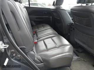 2006 Honda Pilot EX-L with VIN 5FNYF28536B028298, listed as a IAAI auction lot 42104705 with 244,790 mi miles. Bid and sale history available at carsss.com. Image 8.