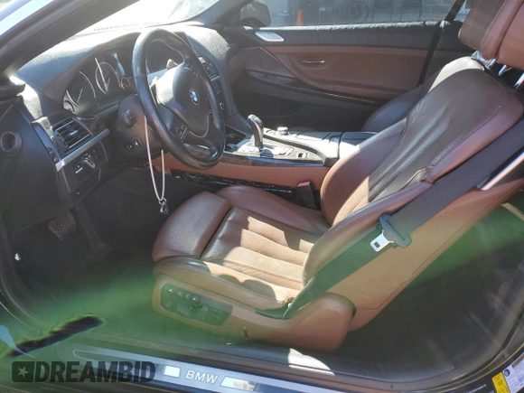 2012 BMW 6 Series 650i z VIN WBALZ3C57CDL73218, wystawiony jako Copart lot #49639975 z przebiegiem 54 408 mil mil oraz Szkoda całkowita • Salvage title. Historia ofert i sprzedaży dostępna na DreamBid. Obrazek 7.