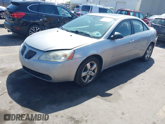 2005 Pontiac G6 GT z VIN 1G2ZH528754171686, wystawiony jako IAAI lot #42241991 z przebiegiem 168 361 mil mil oraz . Historia ofert i sprzedaży dostępna na DreamBid. Obrazek 17.