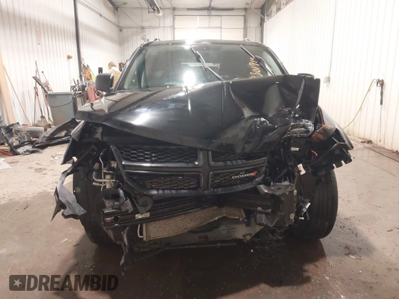 2017 Dodge Journey SE z VIN 3C4PDCAB4HT695490, wystawiony jako IAAI lot #41301719 z przebiegiem 103 642 mil mil oraz . Historia ofert i sprzedaży dostępna na DreamBid. Obrazek 13.