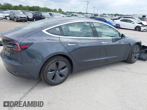 2018 Tesla Model 3 Long Range Battery with VIN 5YJ3E1EB3JF119498, listed as a IAAI auction lot 41966643 with 45,566 mi miles and . Bid and sale history available at DreamBid. Image 4.