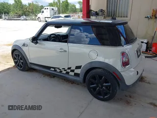 2007 MINI Hardtop with VIN WMWMF33557TL67653, listed as a IAAI auction lot 42581219 with 147,115 mi miles and . Bid and sale history available at DreamBid. Image 3.