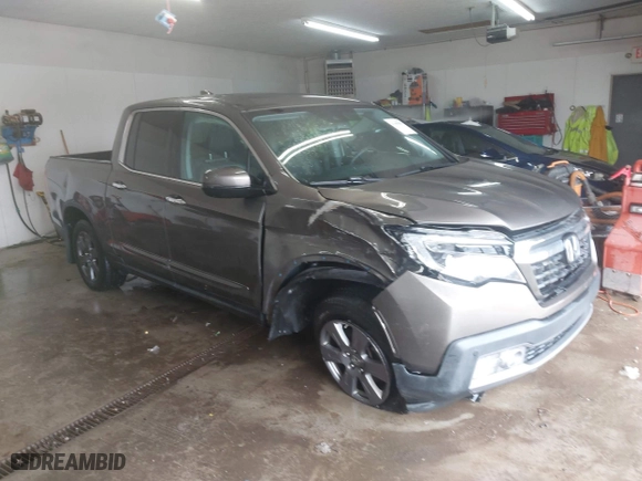 2020 Honda Ridgeline RTL-E with VIN 5FPYK3F75LB001516, listed as a IAAI auction lot 41605859 with 93,902 mi miles. Bid and sale history available at carsss.com. Image 1.