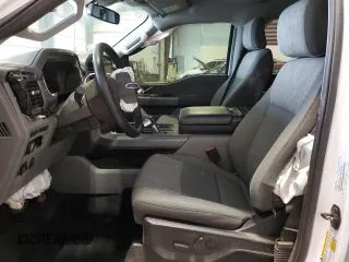 2023 Ford F-150 Lightning Pro z VIN 1FT6W1EV3PWG34249, wystawiony jako Copart lot #46901535 z przebiegiem 9 389 mil mil oraz Szkoda całkowita • Salvage title. Historia ofert i sprzedaży dostępna na DreamBid. Obrazek 7.