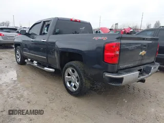 2014 Chevrolet Silverado 1500 LTZ with VIN 1GCVKSEC2EZ246761, listed as a IAAI auction lot 41456717 with 69,073 mi miles and . Bid and sale history available at DreamBid. Image 3.