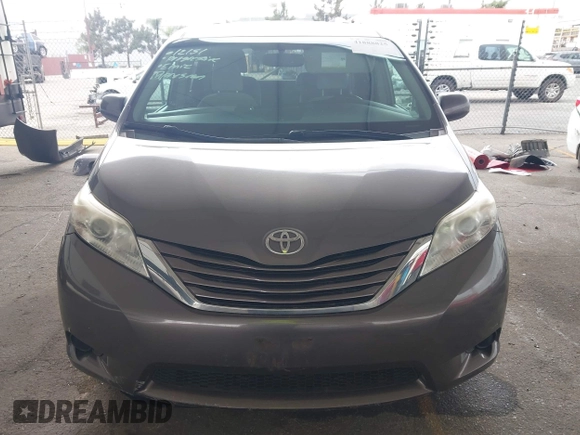 2015 Toyota Sienna LE AAS with VIN 5TDKK3DC8FS585957, listed as a IAAI auction lot 41888825 with 157,364 mi miles and . Bid and sale history available at DreamBid. Image 13.
