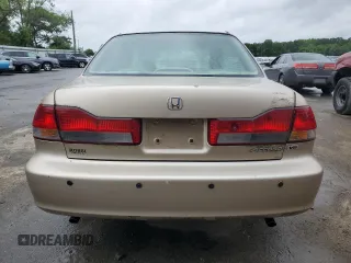 2002 Honda Accord EX z VIN 1HGCG16502A054396, wystawiony jako Copart lot #57170895 z przebiegiem 62 744 mil mil oraz Szkoda całkowita • Salvage title. Historia ofert i sprzedaży dostępna na DreamBid. Obrazek 6.