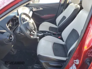 2018 Mazda CX-3 Grand Touring z VIN JM1DKFD75J0319224, wystawiony jako Copart lot #87504495 z przebiegiem 47 466 mil mil oraz Szkody całkowita. Historia ofert i sprzedaży dostępna na DreamBid. Obrazek 7.