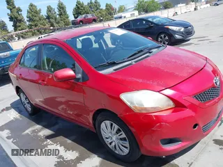 2009 Toyota Yaris with VIN JTDBT903591342243, listed as a IAAI auction lot 42104557 with 407,106 mi miles. Bid and sale history available at carsss.com. Image 1.