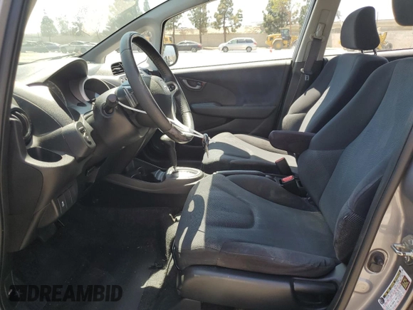 2010 Honda Fit Sport with VIN JHMGE8H69AS025801, listed as a Copart auction lot 58416375 with 216,216 mi miles and Clean title. Bid and sale history available at DreamBid. Image 7.