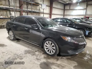 2013 Lincoln MKS with VIN 1LNHL9DK6DG606079, listed as a Copart auction lot 87322174 with 133,383 mi miles and Salvage Title. Bid and sale history available at DreamBid. Image 4.