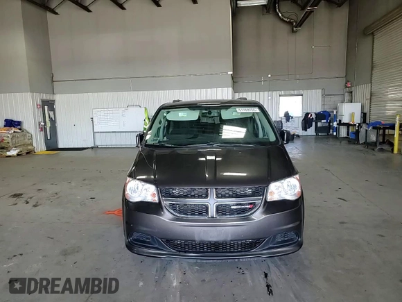 2015 Dodge Grand Caravan SXT with VIN 2C4RDGCG5FR622086, listed as a Copart auction lot 51769155 with 217,538 mi miles and Salvage Title. Bid and sale history available at DreamBid. Image 12.