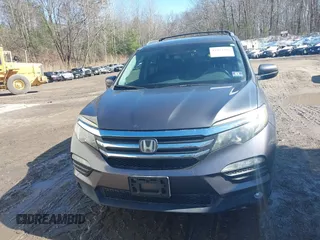 2017 Honda Pilot EX-L z VIN 5FNYF6H63HB027591, wystawiony jako IAAI lot #41854366 z przebiegiem 113 178 mil mil oraz . Historia ofert i sprzedaży dostępna na DreamBid. Obrazek 6.