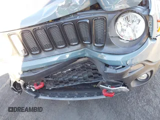 2017 Jeep Renegade Deserthawk with VIN ZACCJBCB1HPG12779, listed as a IAAI auction lot 41294595 with 92,316 mi miles and . Bid and sale history available at DreamBid. Image 6.