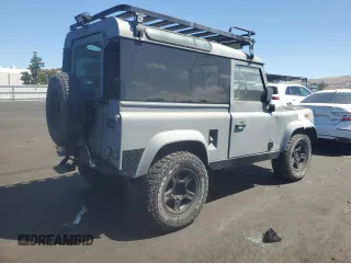 1990 Land Rover Defender z VIN SALLDVAF7HA478978, wystawiony jako Copart lot #65643315 z przebiegiem 76 116 mil mil oraz Czysty tytuł • Clean title. Historia ofert i sprzedaży dostępna na DreamBid. Obrazek 3.