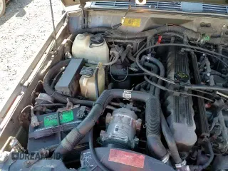 1992 Jeep Grand Cherokee with VIN 1J4FJ58S5NL233088, listed as a Copart auction lot 83081404 with 231,696 mi miles and Salvage title. Bid and sale history available at DreamBid. Image 14.