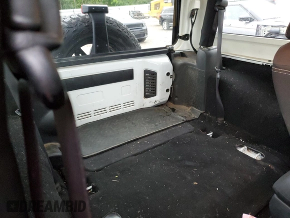 2013 Jeep Wrangler Sahara with VIN 1C4AJWBGXDL579341, listed as a Copart auction lot 55970815 with 105,961 mi miles and Salvage title. Bid and sale history available at DreamBid. Image 11.