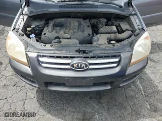 2007 Kia Sportage LX with VIN KNDJF724077447389, listed as a Copart auction lot 53170305 with 238,396 mi miles and Clean Title. Bid and sale history available at carsss.com. Image 12.
