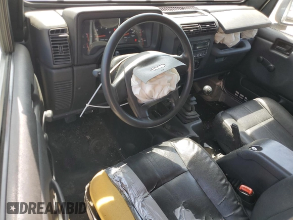 2004 Jeep Wrangler Sport with VIN 1J4FA49S44P788467, listed as a Copart auction lot 55395625 with 187,289 mi miles and Salvage title. Bid and sale history available at DreamBid. Image 8.