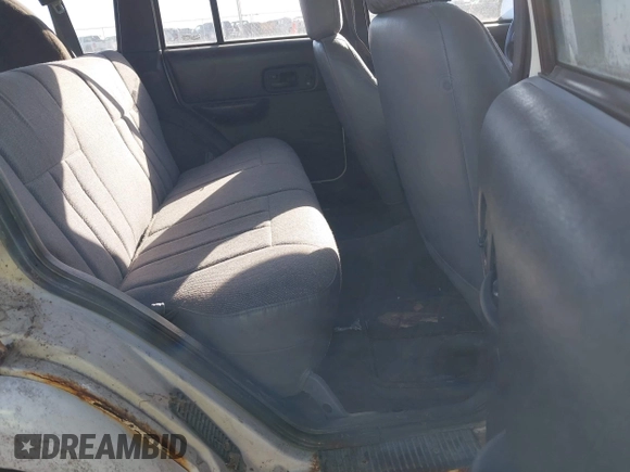 1999 Jeep Cherokee Sport with VIN 1J4FF68S0XL628564, listed as a IAAI auction lot 41508373 with 244,596 mi miles and . Bid and sale history available at DreamBid. Image 8.