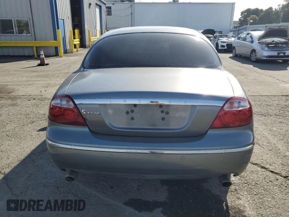 2005 Jaguar S-Type with VIN SAJWA01T15FN13800, listed as a Copart auction lot 53576305 with 182,533 mi miles and Salvage Title. Bid and sale history available at DreamBid. Image 6.