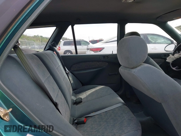 1997 Ford Escort LX with VIN 3FALP15P1VR169817, listed as a IAAI auction lot 42094673 with 111,762 mi miles. Bid and sale history available at carsss.com. Image 8.