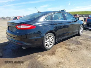 2016 Ford Fusion SE with VIN 3FA6P0H74GR282280, listed as a IAAI auction lot 42023017 with 90,802 mi miles. Bid and sale history available at carsss.com. Image 4.