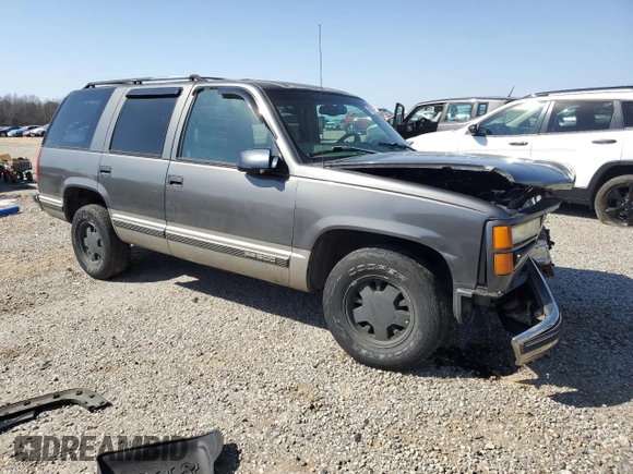 1999 GMC Yukon with VIN 1GKEC13R9XJ805842, listed as a Copart auction lot 48952625 with 259,149 mi miles and Clean Title. Bid and sale history available at carsss.com. Image 4.