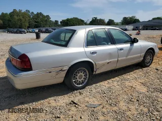 2002 Mercury Grand Marquis GS z VIN 2MEFM74W82X659338, wystawiony jako Copart lot #53887785 z przebiegiem 155 266 mil mil oraz Szkoda całkowita • Salvage title. Historia ofert i sprzedaży dostępna na DreamBid. Obrazek 3.