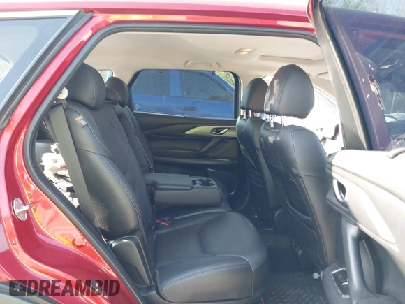 2019 Mazda CX-9 Touring with VIN JM3TCACY0K0310851, listed as a IAAI auction lot 42066395 with 91,046 mi miles and . Bid and sale history available at DreamBid. Image 8.